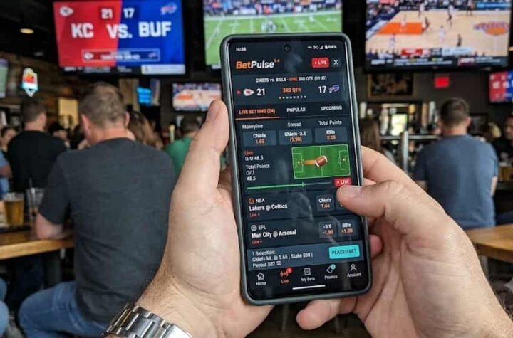 A modern smartphone showcasing live sports betting app layouts reflecting current iGaming industry trends